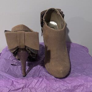 XOXO Tan Heeled Boots with Bow Accent